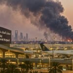 Smoke and flames rising near King Khalid International Airport in Riyadh, Saudi Arabia